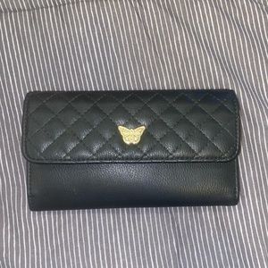 Max Studio Medium sized butterfly/cheetah wallet